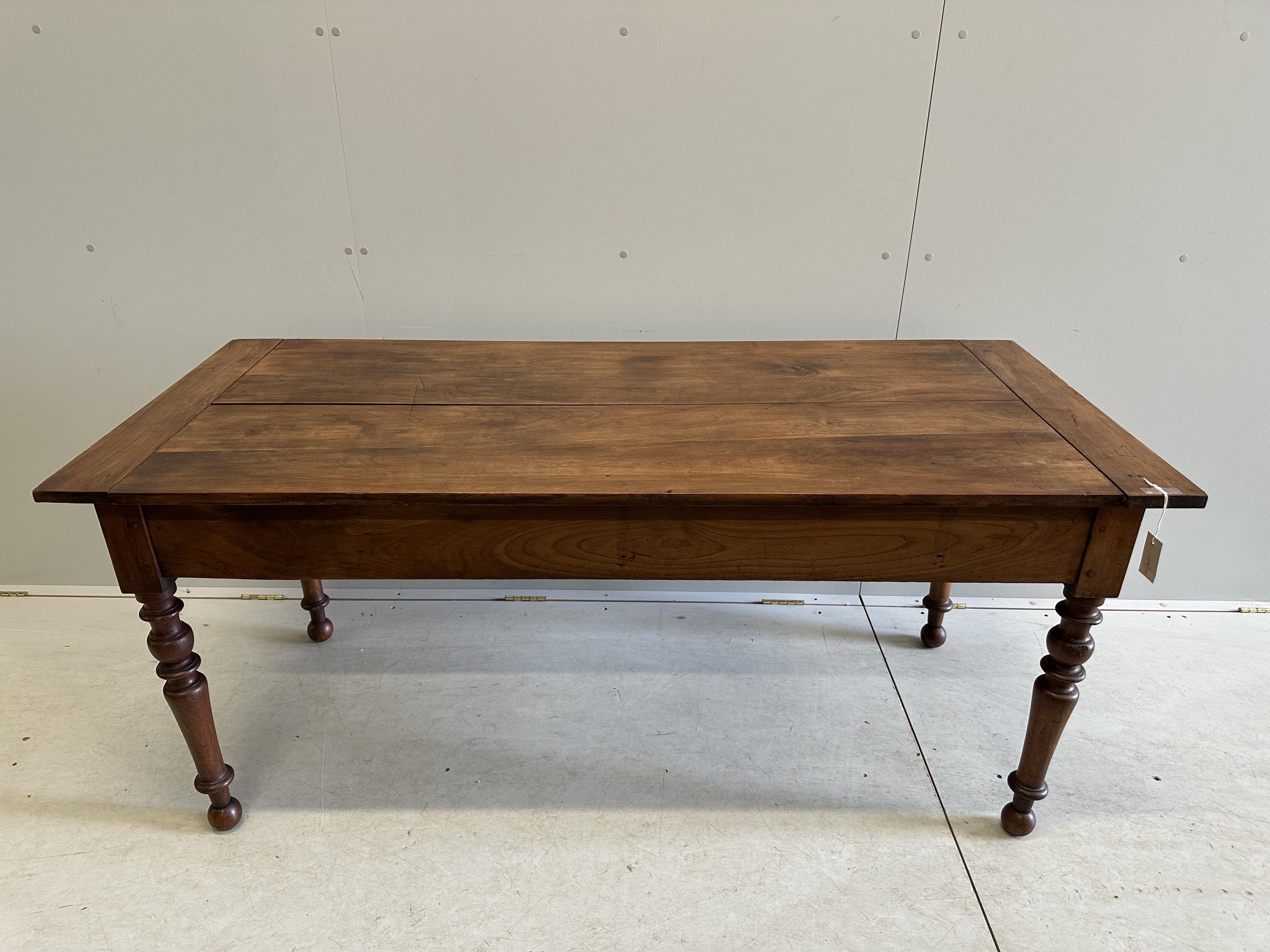 A 19th century French rectangular cherry farmhouse table, width 167cm, depth 73cm, height 73cm. Condition - fair